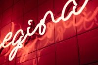 Kaboompics - Red Cursive Neon Sign on Glossy Tiled Wall