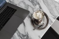 Kaboompics - Laptop and Whipped Cream Dessert on Arabescato Marble