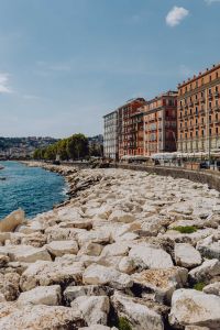 Kaboompics - Vertical View Along Naples Rocky Waterfront Toward Seaside Buildings