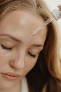 Kaboompics - Macro Beauty Shot of a Serum Drop on the Forehead