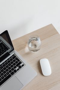 Kaboompics - Top View of Laptop, Glass of Water and Mouse