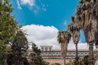 Kaboompics - Palazzo Reale in Naples Framed by Palm Trees and Garden