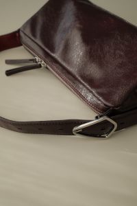 Kaboompics - Cherry Burgundy Shoulder Bag Strap Detail