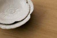 Kaboompics - White Ceramic Plate Stack with Wood Copy Space, Minimal Neutral Table Decor