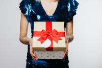 Kaboompics - Blue Sequin Holiday Outfit with a White Gift Box and Red Ribbon