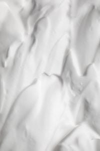 Kaboompics - Thick White Cream Swirls with Pointed Peaks, Close-Up Beauty Product Texture