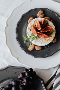 Kaboompics - Overhead Camembert Platter with Fig Topping and Grapes