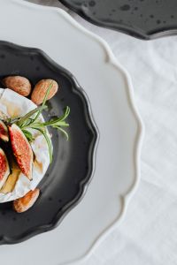 Kaboompics - Minimal Camembert and Figs Cropped Beside White Copy Space