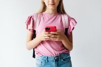 Kaboompics - Young Woman Texting on Phone at Home