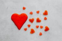 Kaboompics - Large Red Heart With Message Candies on Gray Valentine Background