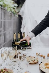 Glasses with white wine and champagne