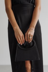 Kaboompics - Black Satin Outfit with Structured Handbag and Jewelry