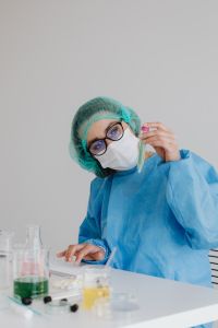 Kaboompics - Scientist Inspecting Test Tube for Chemistry Experiment