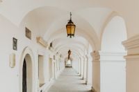 Kaboompics - Arcaded Cloister Corridor with Lanterns in Zamość