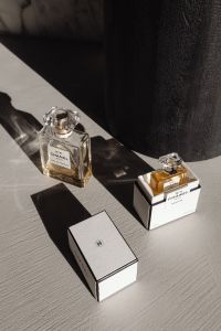 Kaboompics - Chanel Perfume Bottles and Boxes with Strong Shadows