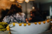 Kaboompics - Yellow Fringe Decorative Pillows