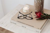 Kaboompics - Glasses and Dried Flowers on Art Books