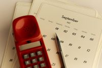 Kaboompics - September 2027 Planning Calendar With Retro Red Telephone