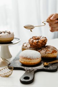 Kaboompics - Homemade Raspberry Polish Paczki Donut with Powdered Sugar