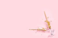 Kaboompics - Happy New Year Pink Background with Gold Confetti
