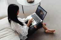 Kaboompics - Woman Working on a Laptop in a Calm Living Room