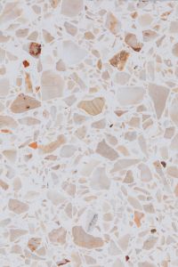 Kaboompics - Pale Cream Terrazzo Texture with Fine Tan Aggregate, Soft Warm Background
