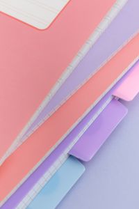 Kaboompics - Pastel Notebook Stack with Colorful Tabs