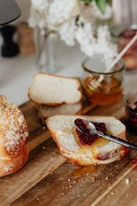 Kaboompics - Challah Toast With Raspberry Jam in Floral Breakfast Setting