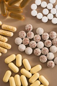 Kaboompics - Assorted Vitamins and Tablets on a Beige Background