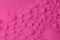 Kaboompics - Vibrant Pink Water Drop Texture With Fine Beads