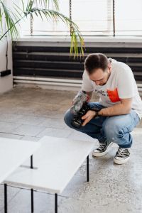 Kaboompics - Filmmaker with DSLR Camera Taking Shoots