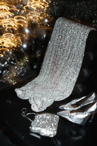 Kaboompics - Silver Glitter Chair with Shoes and Party Accessories