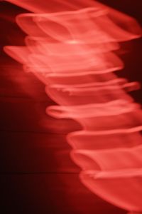 Kaboompics - Layered Red Neon Light Trails Forming Soft Waves