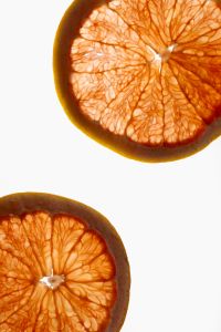 Kaboompics - Grapefruit Slices on White Background