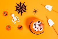 Kaboompics - Halloween Candy Bucket With Ghosts and Spiderweb