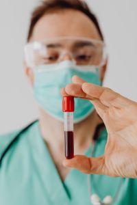 Kaboompics - Close-Up Blood Sample Held by Doctor