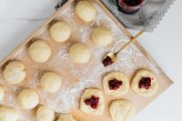 Kaboompics - Overhead Cherry-Filled Pączki Dough on a Wooden Board