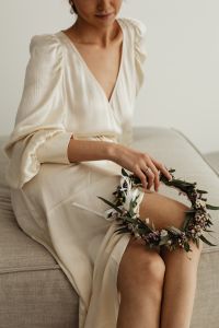 Kaboompics - Bridal Accessories Detail With a Floral Wreath Resting on a Lap