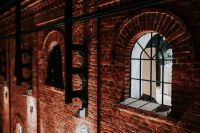 Kaboompics - Red brick wall with small windows