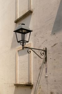 Kaboompics - Vintage Black Wall Lantern on White Plaster Facade, Italian Street