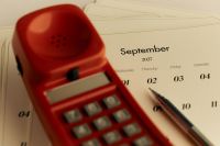 Kaboompics - September 2027 Calendar With Retro Red Telephone
