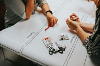 Kaboompics - Team Brainstorming Table with Markers, Scissors and Copy Space