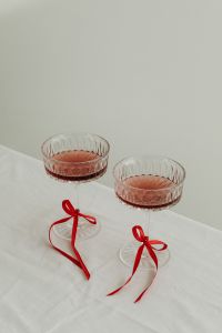 Kaboompics - Red Cocktails in Crystal Glasses with Satin Bows