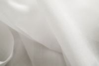 Kaboompics - Pantone 2026 Cloud Dancer: Soft White Textile and Ceramic Detail