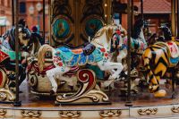 Kaboompics - Painted Carousel Horses and Gilded Platform at Manufaktura in Łódź, Poland
