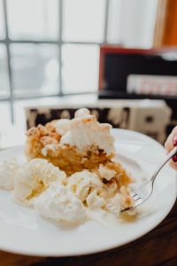 Kaboompics - Apple pie with whipped cream and ice cream in Cafe Verte