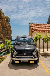 Kaboompics - Vintage Fiat 500 Parked on a Coastal Italian Street