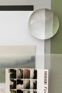 Kaboompics - Editorial Photo Collage with Contact Sheet Translucent Paper and Glass Paperweight