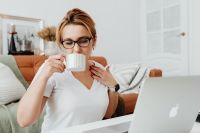 Kaboompics - Quiet Morning Coffee on the Sofa for a Home-Based Business Owner
