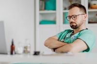 Kaboompics - Doctor Working Quietly at Medical Office Desk
